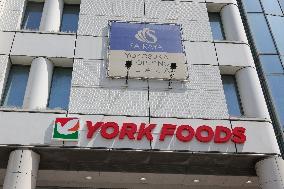 Signboards and logos of Saikaya Yokosuka and York Foods